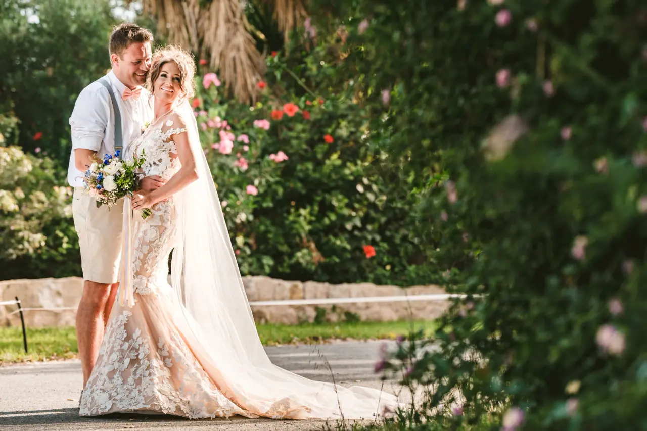 Amie and Graeme in a rose garden at golden hour, Vasilias Nikoklis Inn, Paphos