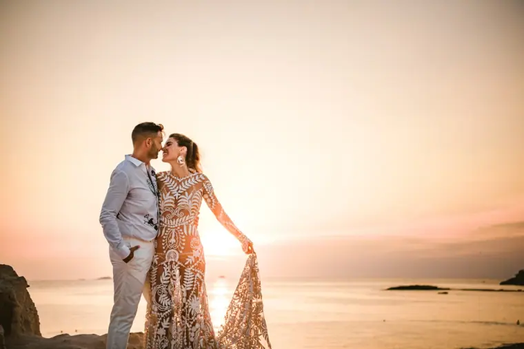 Kenton and Hassiba sharing a quiet moment on the clifftop at sunset, Sunset Ashram, Cala Conta