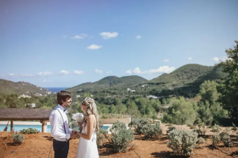 Bride and groom seeing each other for the first time on the villa terrace