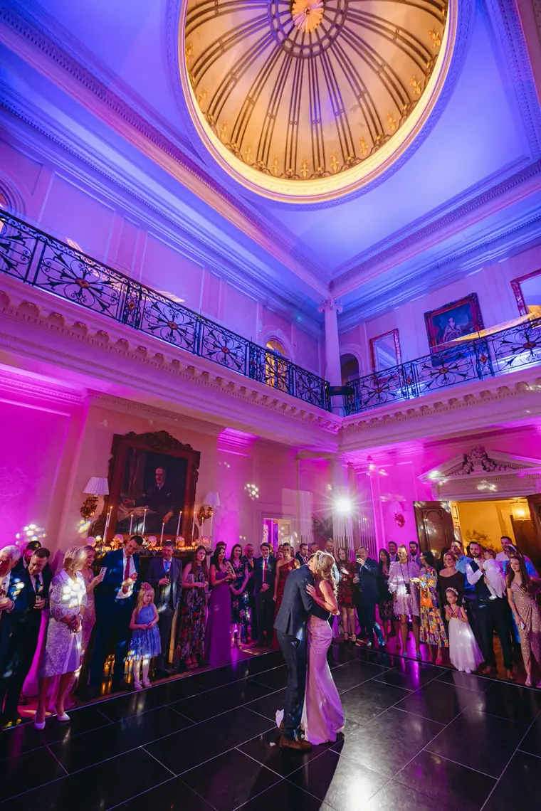 First dance under purple lights beneath the domed ceiling at Hedsor House
