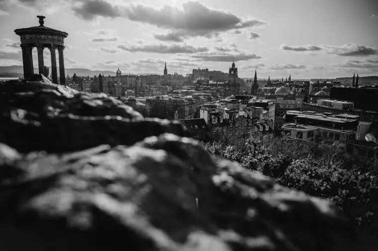 Black-and-white view of the Dugald Stewart Monument overlooking Edinburgh