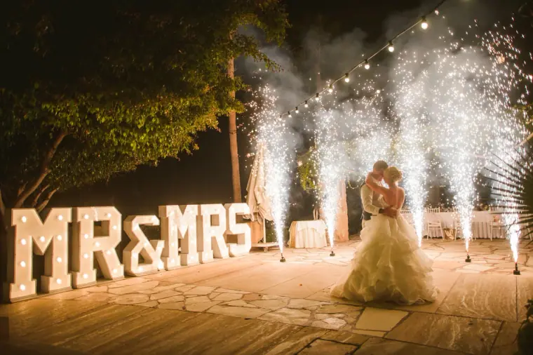 First dance between sparkler fountains and Mr & Mrs letters at Coral Beach Hotel, Paphos