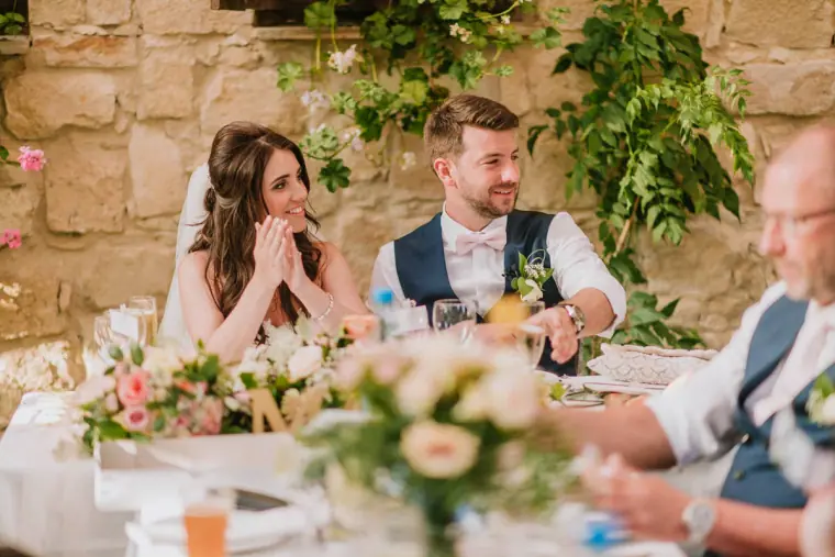 Claire laughing at the top table during the speeches