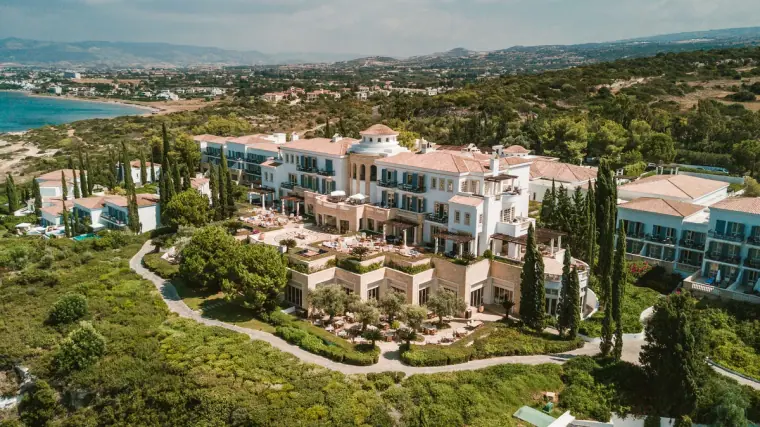 Aerial view of the Anassa hotel among gardens above the coast near Polis, Cyprus