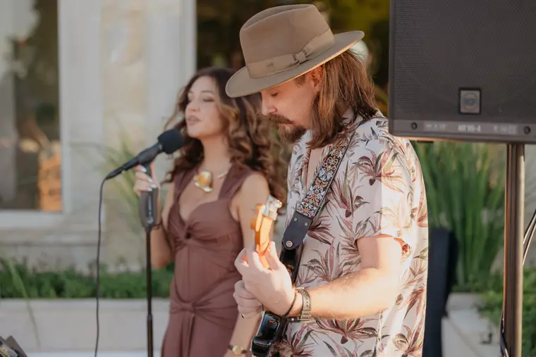 Singer and guitarist performing on the terrace at Anassa